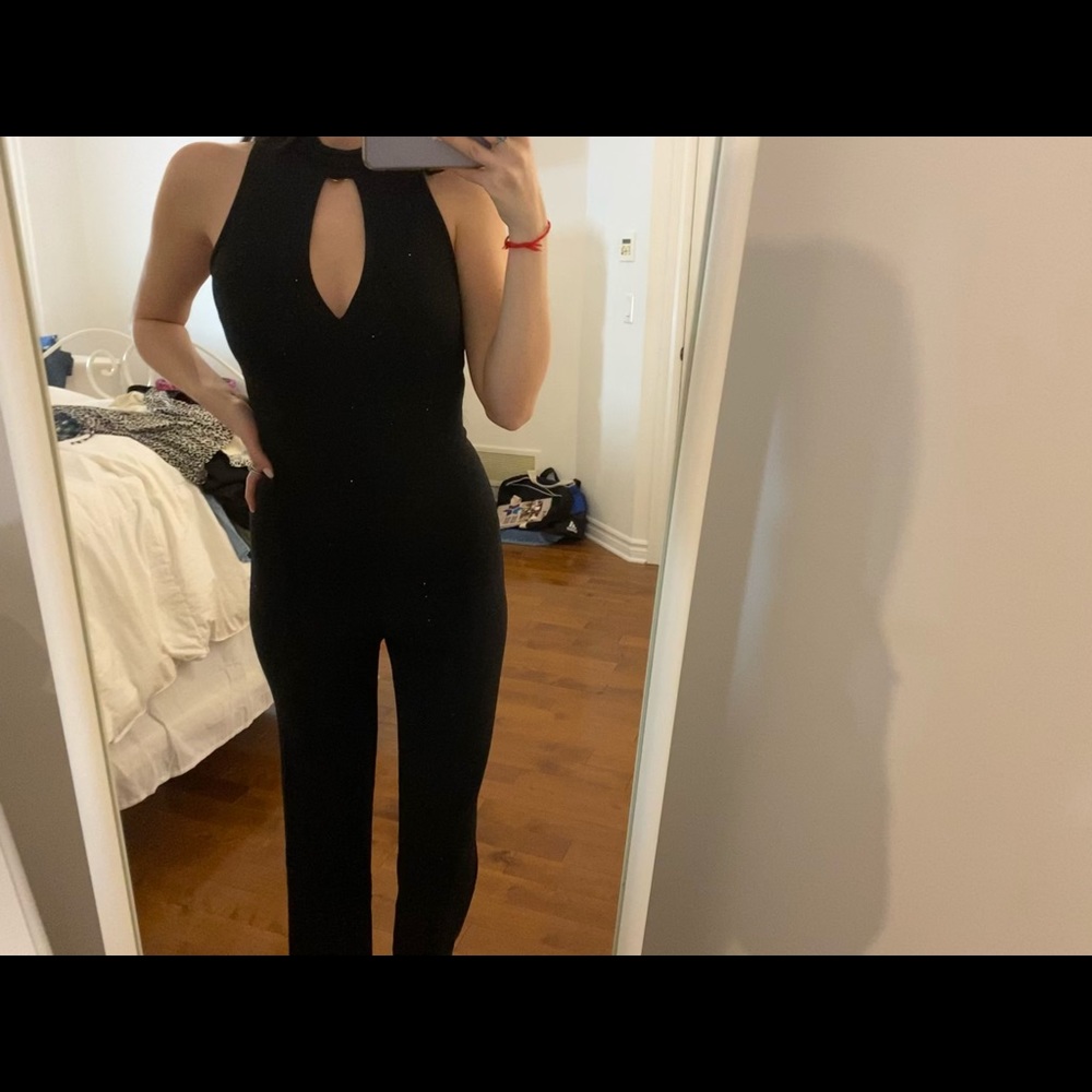 black sparkly jumpsuit.